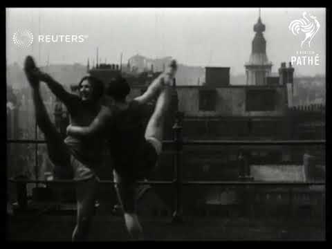 Scenes from a hot April in London, including chorus line dancing on roof, swimming at Kenw...(1928)