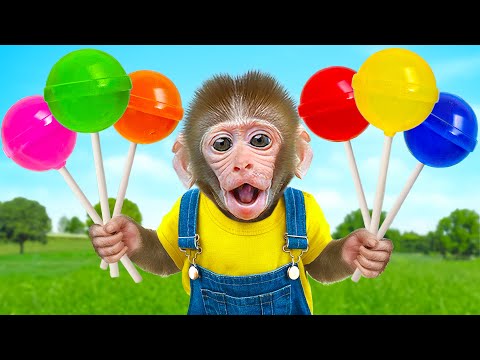 KiKi Monkey unbox Rainbow Lollipop Candy so satisfying at the supermarket | KUDO ANIMAL KIKI