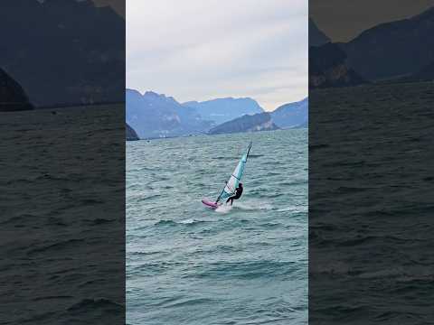 Watch this incredible windsurfer defy the elements #AdrenalineRush #windsurfing #lakegarda #🌊 #🇮🇹