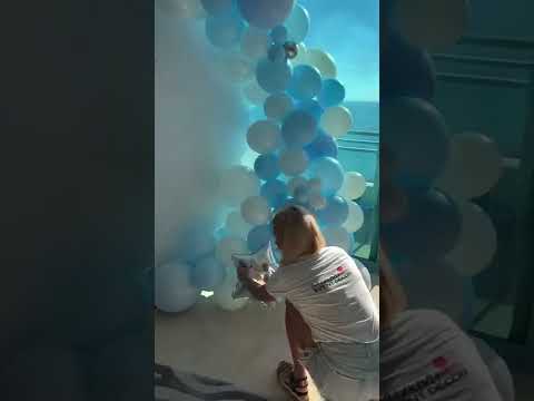 Round backdrop with balloon garland