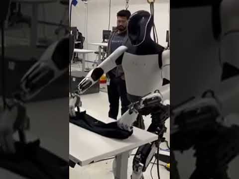 #tesla robot folding clothes