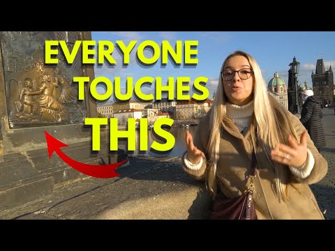 Statue of St John of Nepomuk on Charles Bridge - Legend and Why do people touch his statue