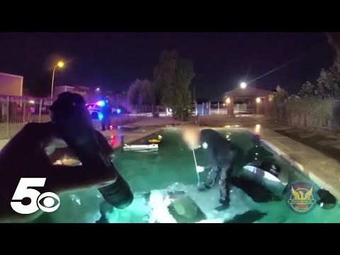 Phoenix police rescue man trapped in submerged vehicle