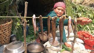 The primitive life in the mountains of Nepal, living in a shed by the river, eating delicious food