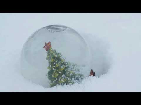 Relaxing Christmas music with fireplace and snowfall