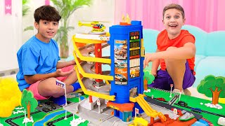 Roma and Friend play with Toy Cars and Build Matchbox City