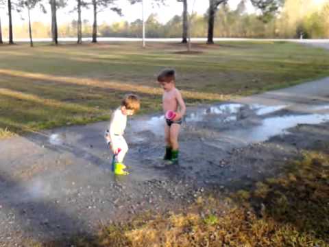 Will and Parker playing the Mud puddle 2013-04-12 18.40.00