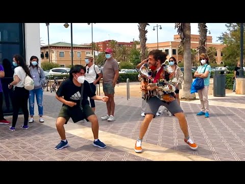 Street guitarist Challenged by Air Guitar Player - Funny reaction