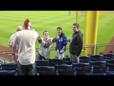 Phillies fan throws Mets fan’s phone onto the field